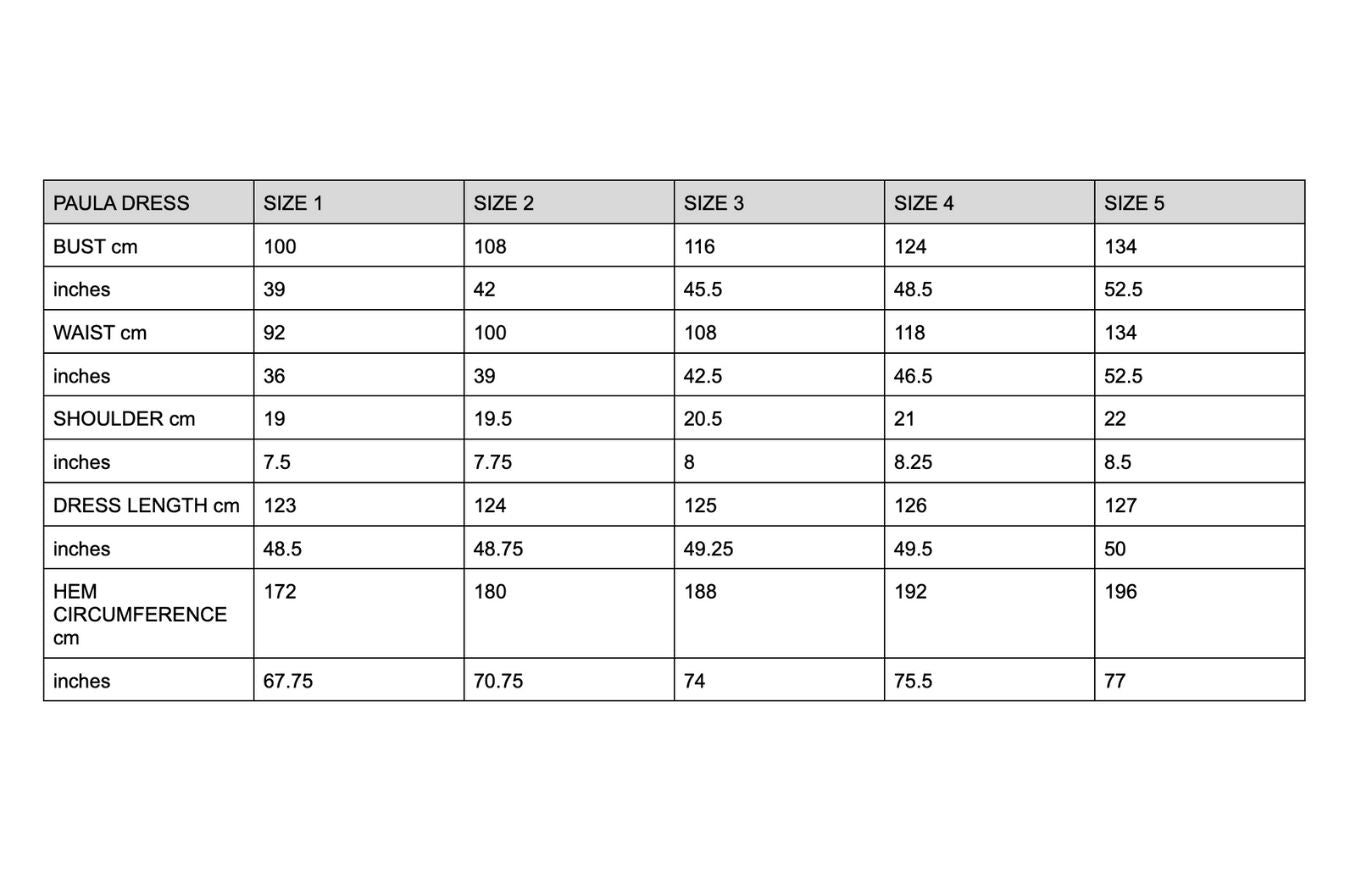 Measurement chart for 'Paula Dress' with size specifications in centimeters and inches.