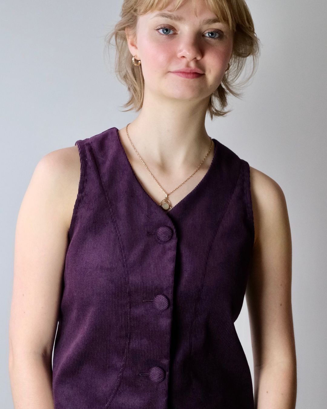 Women's waistcoat. with structured panels and covered buttons.  Sustainable brand, made in England