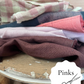 A collection of premium scraps for zero waste sewing projects. all pinks.