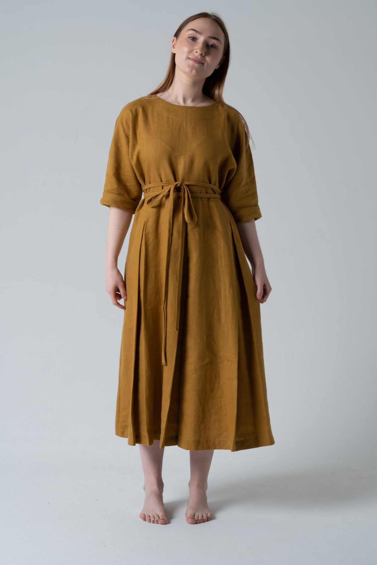 Linen dress Helen with pleated skirt, dolman sleeves and self tie belt.