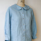 blue linen shirt on dress makers dummy