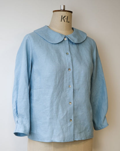 blue linen shirt on dress makers dummy